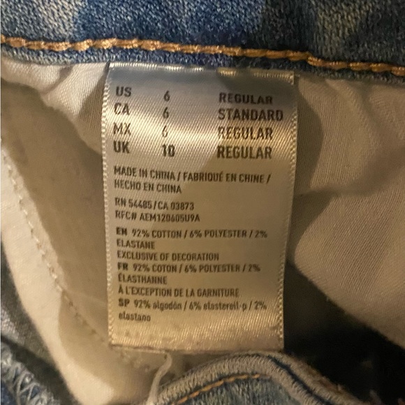 American Eagle | High Rise Super Stretch Skinny Distressed Light Blue Jeans - Picture 7 of 7